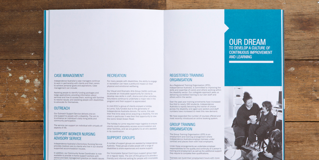 Photo of a internal spread for an annual report, includes feature image and pull out quote. 